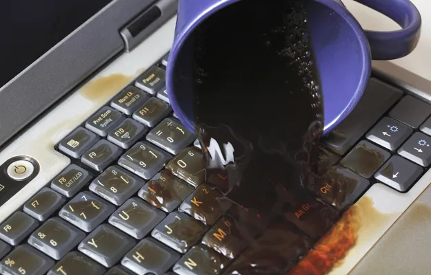 Spilled liquid on laptop